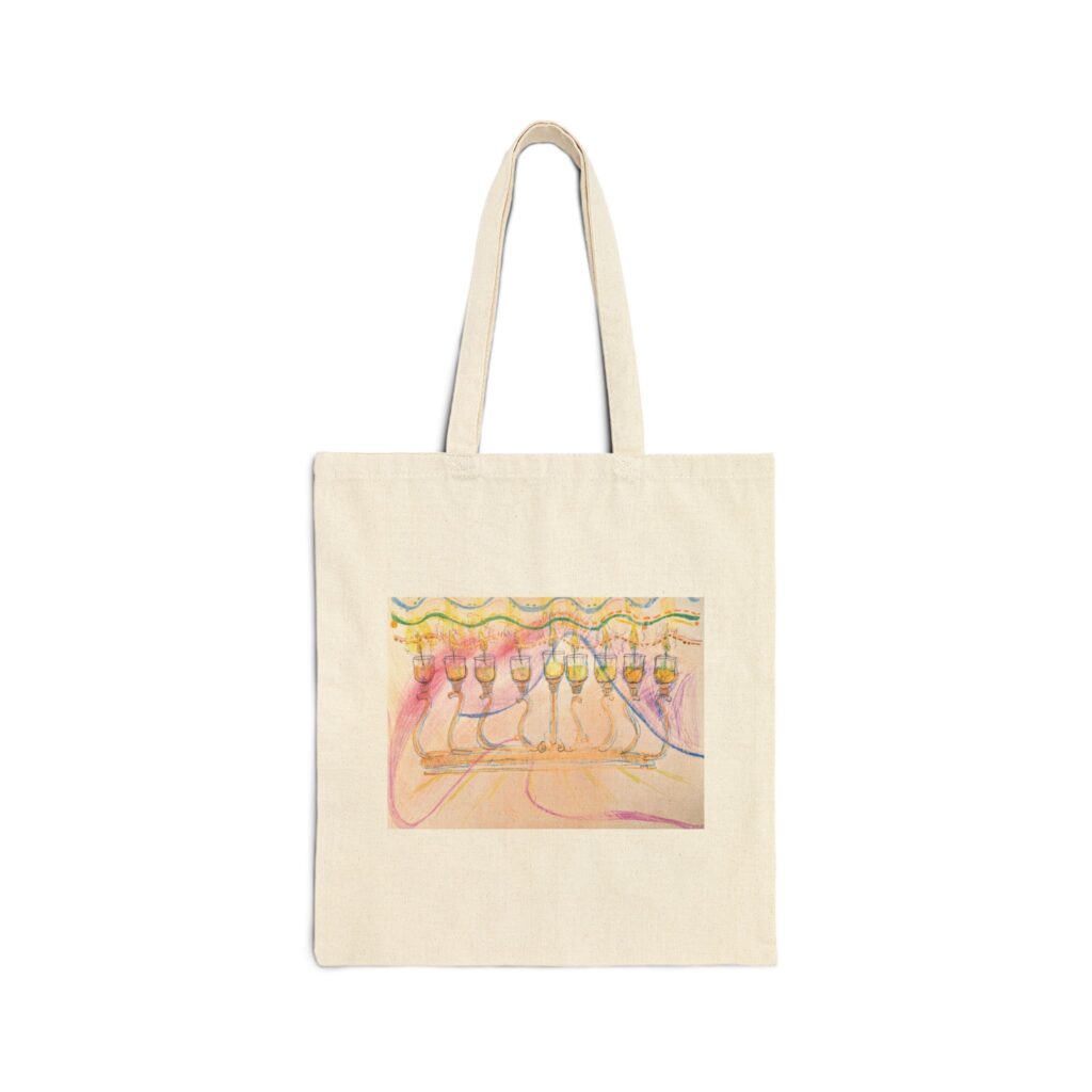 Front view of a natural canvas tote bag with long handles and pastel Hanukkah menorah artwork